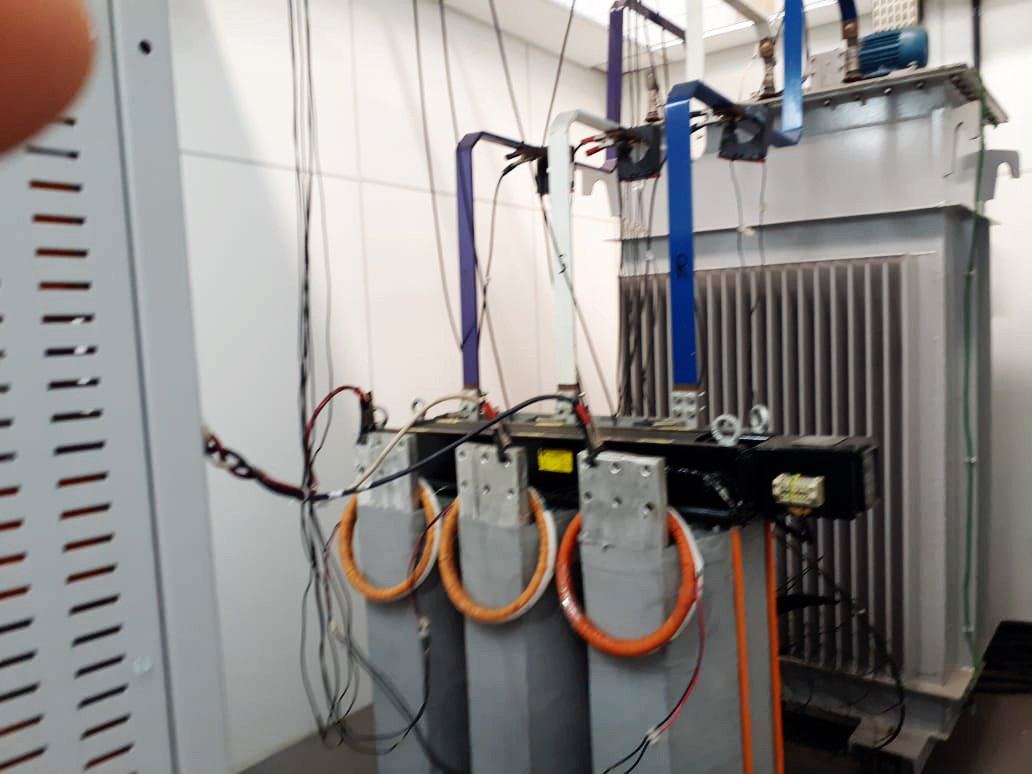 The high-voltage test transformer, cabled for a withstand test