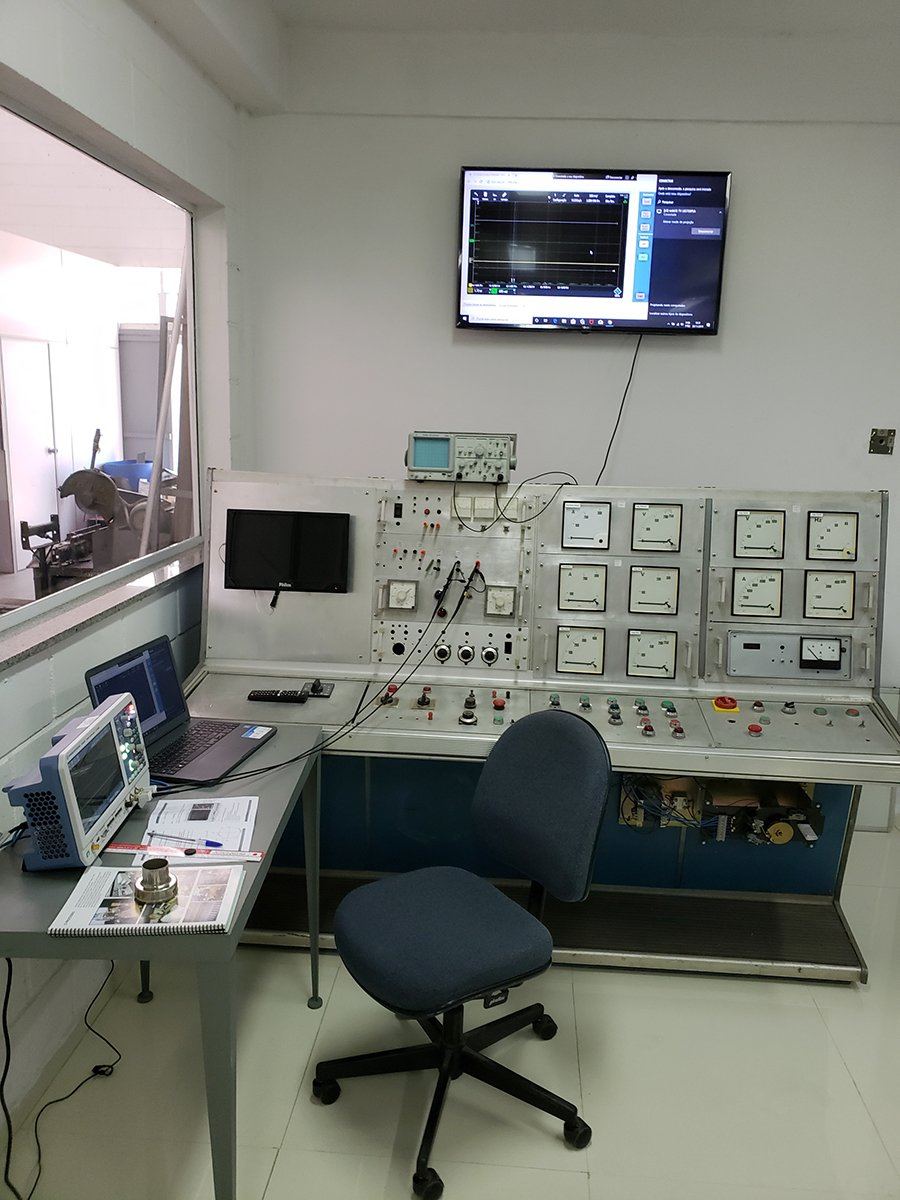 The laboratory instrument bench and oscilloscope display
